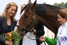 Michelle Payne and 2015 Melbourne Cup winner Prince Of Penzance with Rachel Griffiths, the director and produicer of the movie "Ride Like A Girl". Picture by Lachlan Bence.